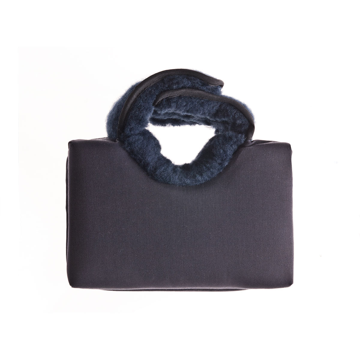 Heel elevation cushion with flat base and wipeable cover