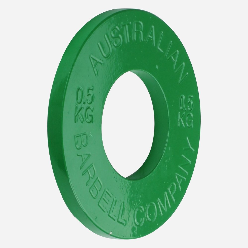Green weight plate with 'Australian Barbell Company' branding on a white background