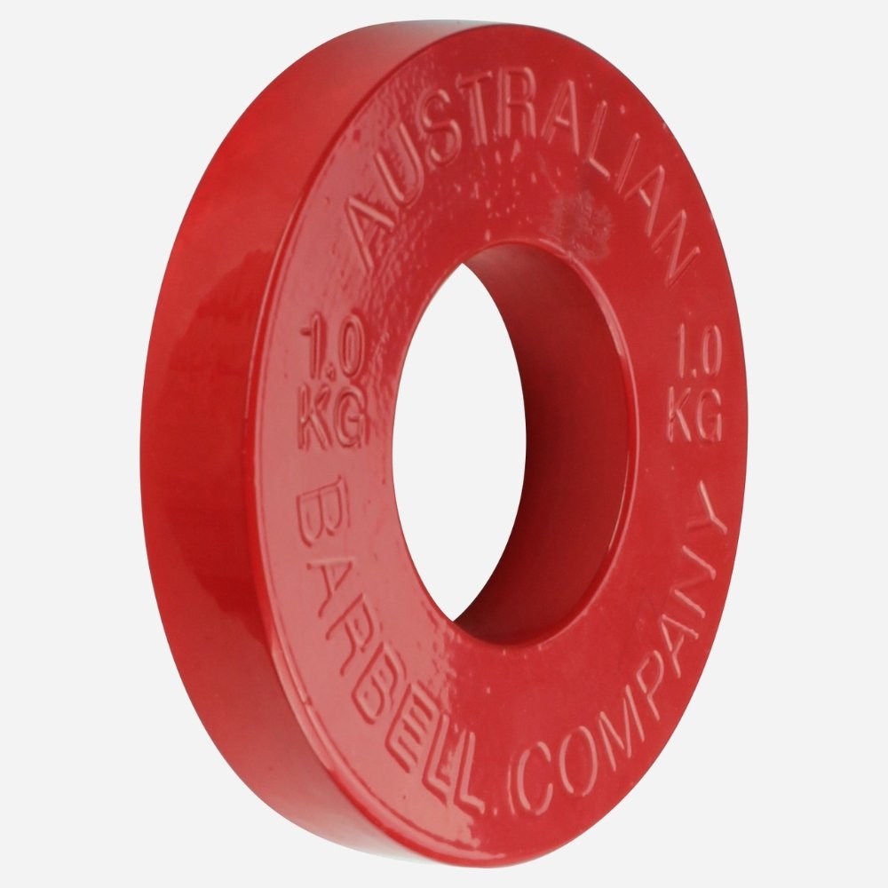 Red weight plate with 'Australian Barbell Company' branding on a white background