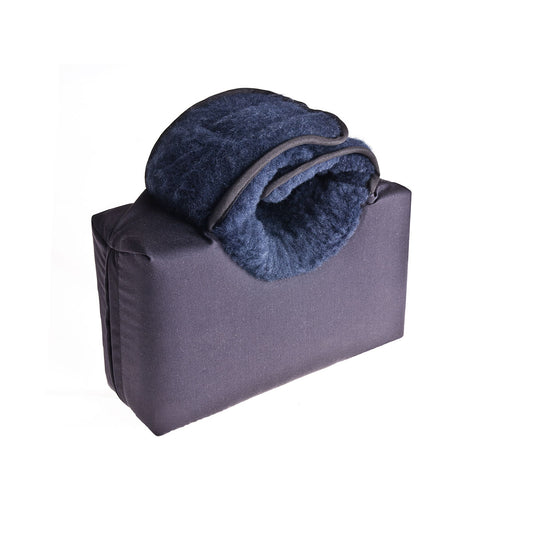 Heel elevation cushion with flat base and wipeable cover