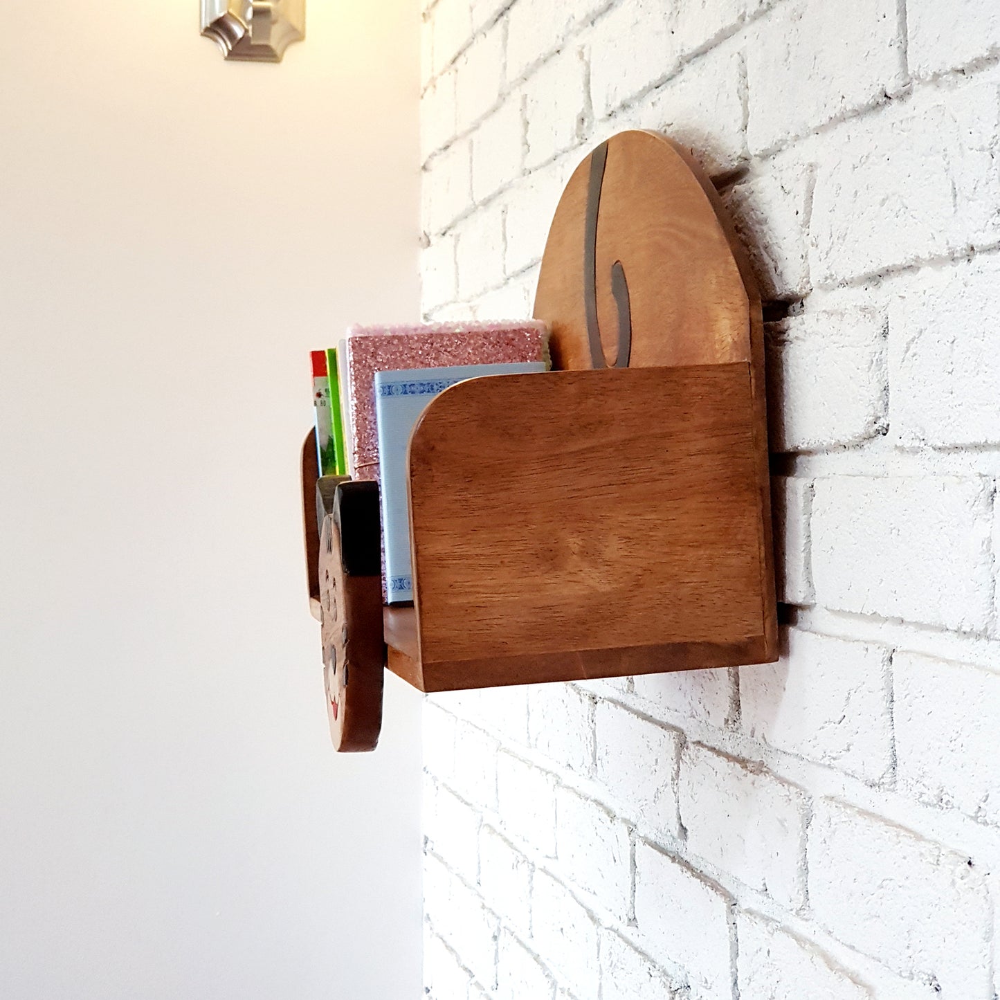 Hand-carved bear wall-mounted bookshelf in solid Raintree wood