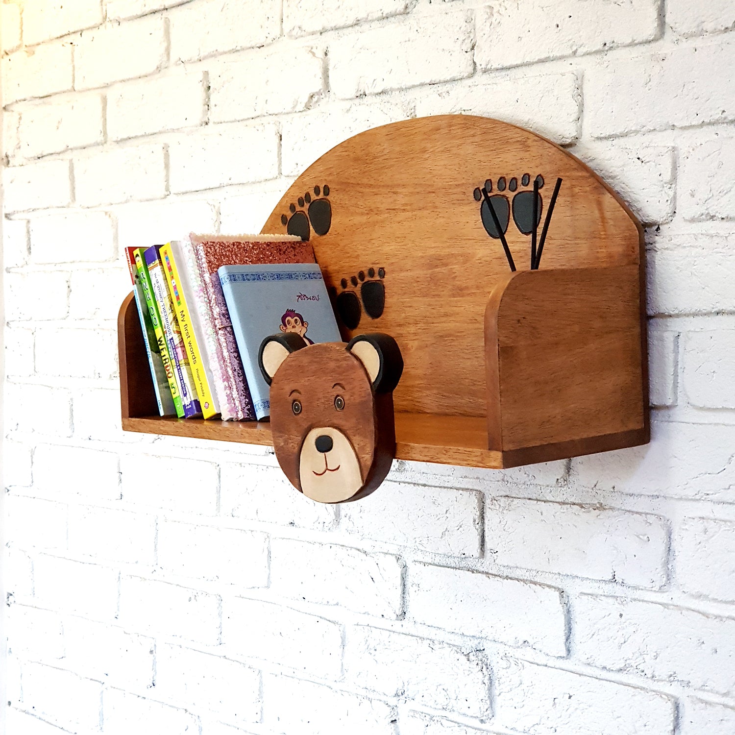 Hand-carved bear wall-mounted bookshelf in solid Raintree wood