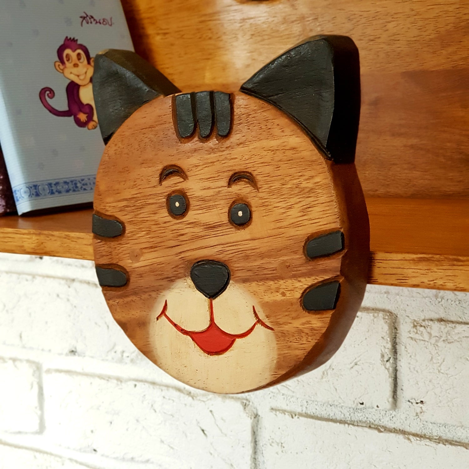Hand-carved cat wall-mounted bookshelf in solid Raintree wood