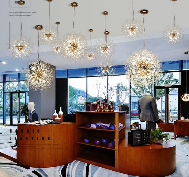 60cm rose gold Firefly chandelier pendant with 16 warm-light LED bulbs