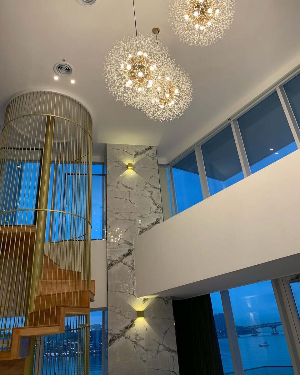 60cm rose gold Firefly chandelier pendant with 16 warm-light LED bulbs