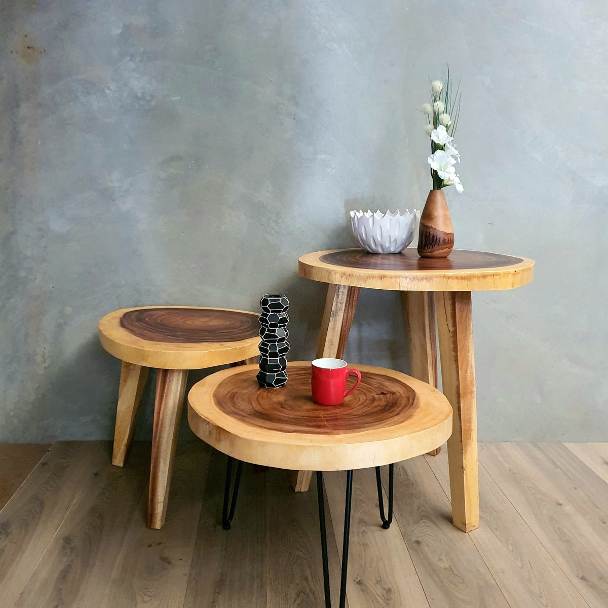 Round solid Raintree wood live edge coffee table with black metal legs