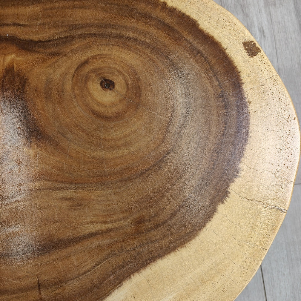 Round solid Raintree wood live edge coffee table with black metal legs