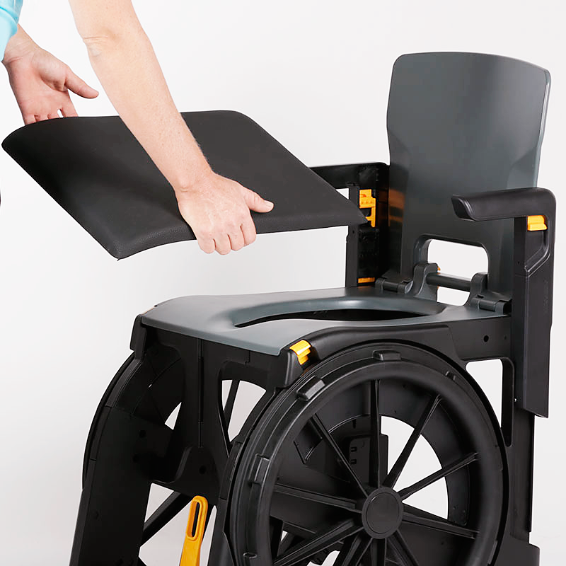 Upholstered wheelchair seat — water-resistant shower & transport