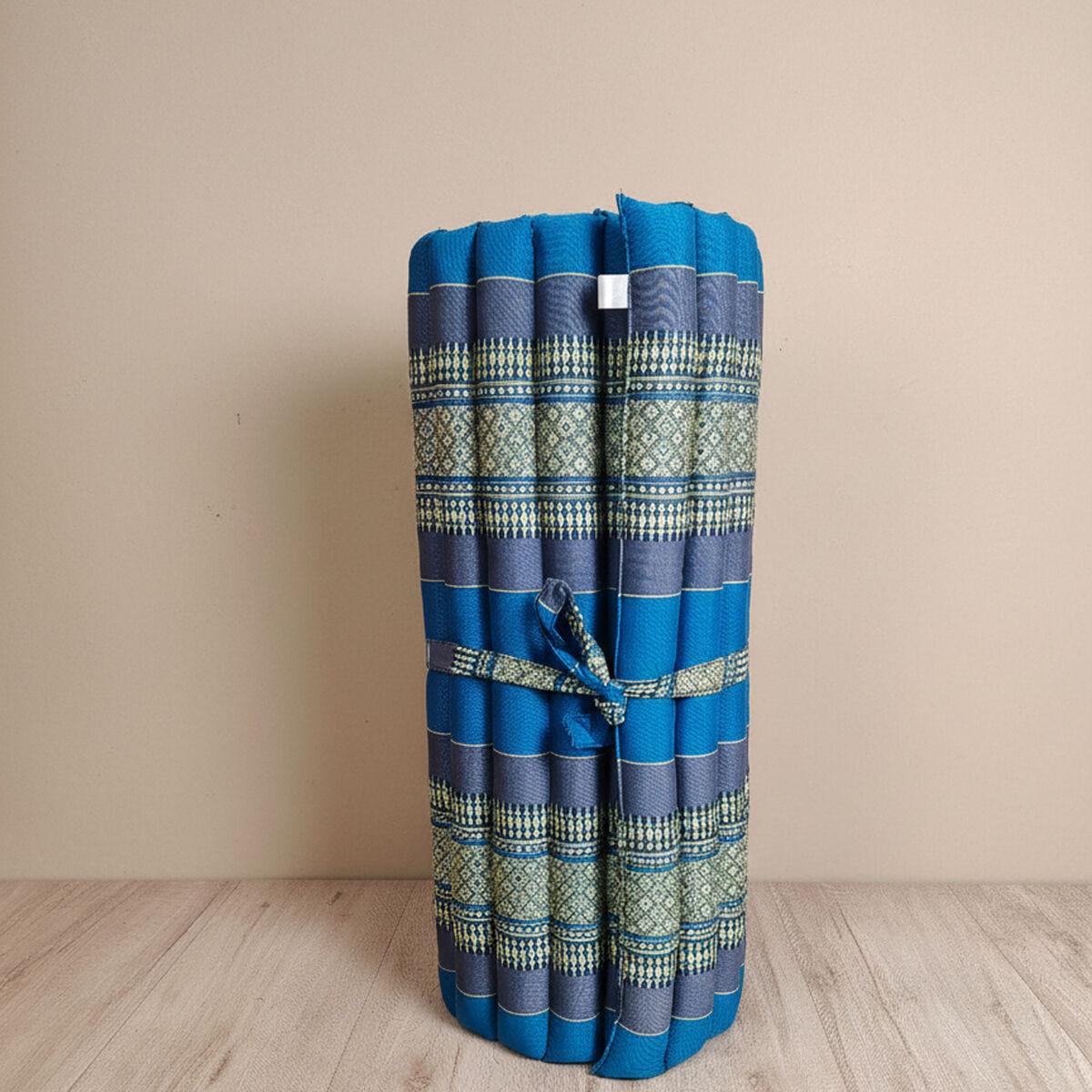 Blue single roll-up kapok mattress measuring approximately 188 x 92cm