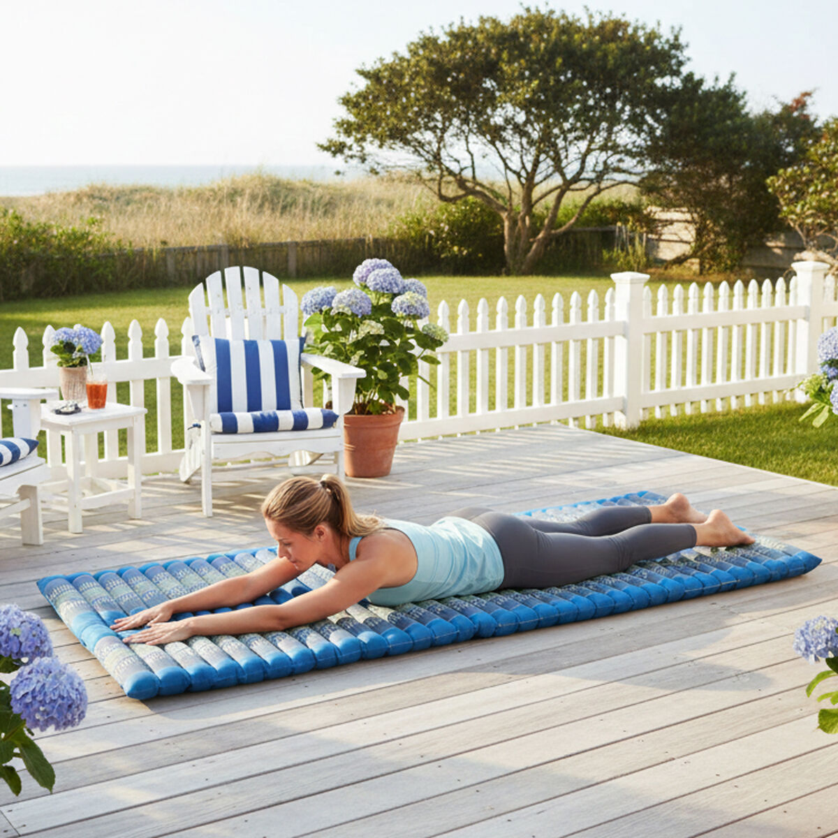 Blue single roll-up kapok mattress measuring approximately 188 x 92cm