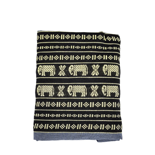 Folded fabric with elephant pattern on a white background, featuring the MangoTrees brand.