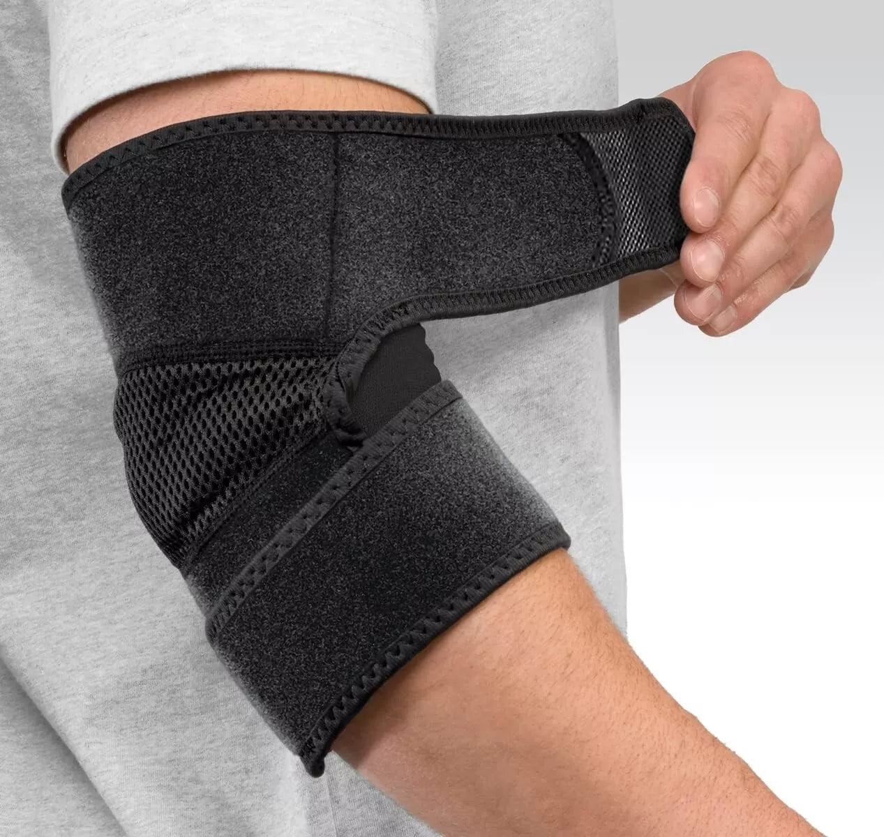 Mueller Adjustable Elbow Support For Pain Elbow Sprains, Tennis & Golfers Elbow